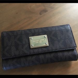 Michael Kors trifold wallet.